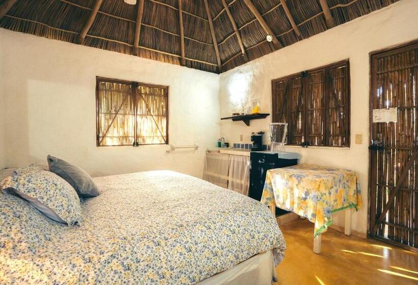 מיטת קינג בסוויטה, Junto Al Rio Bungalows & Suites