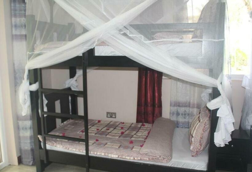 اتاق خانوادگی با چشم‌انداز باغ, Kijiji Beach Resort