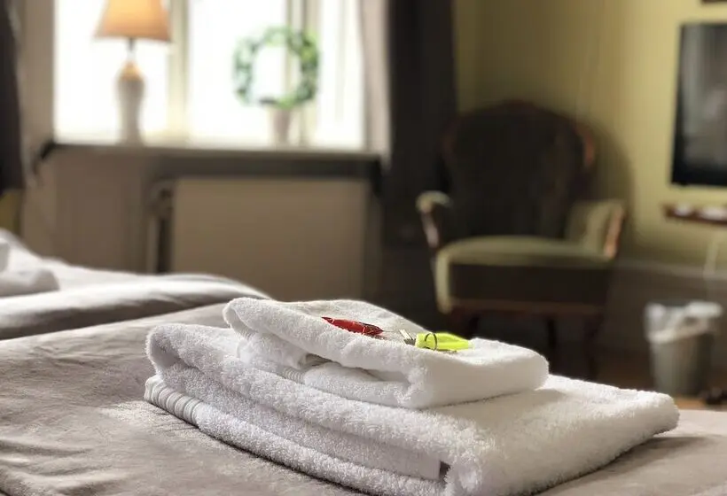 اتاق استاندارد با سرویس بهداشتی مشترک, Järnvägshotellet