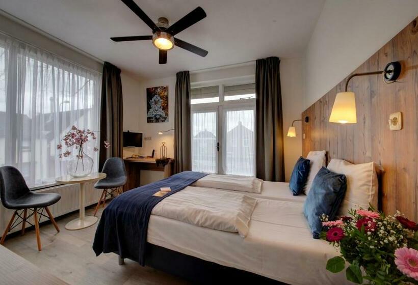 חדר אקונומי, De Kroon