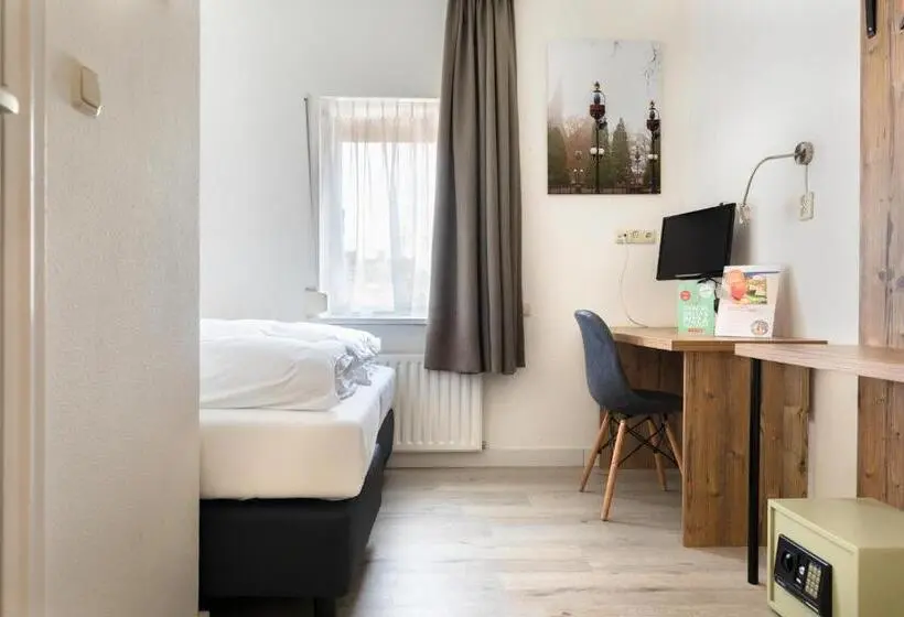 Economy Yhden Hengen Huone, De Kroon