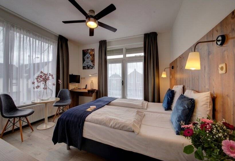 חדר אקונומי, De Kroon