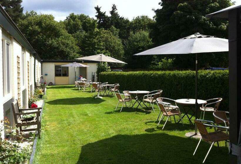 חדר משפחתי, Restaurant  De Vossenberg