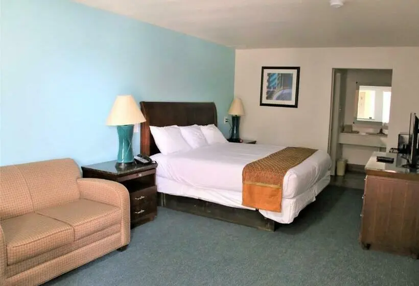 キングサイズベッドのスタンダードルーム, Executive Inn & Suites Cuero