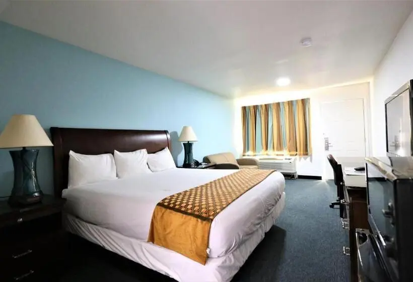 キングサイズベッドのスタンダードルーム, Executive Inn & Suites Cuero