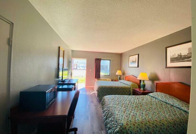 غرفة ديلوكس, Traveler's Place Inn & Suites