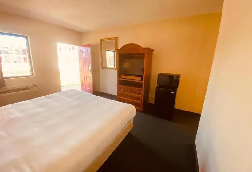 身障者適用キングサイズベッドルーム, Traveler's Place Inn & Suites