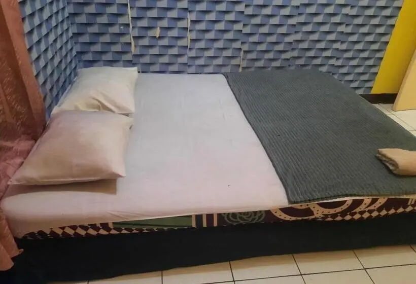 キングサイズベッドのデラックスルーム, Oyo 94021 Guest House Pak Eman