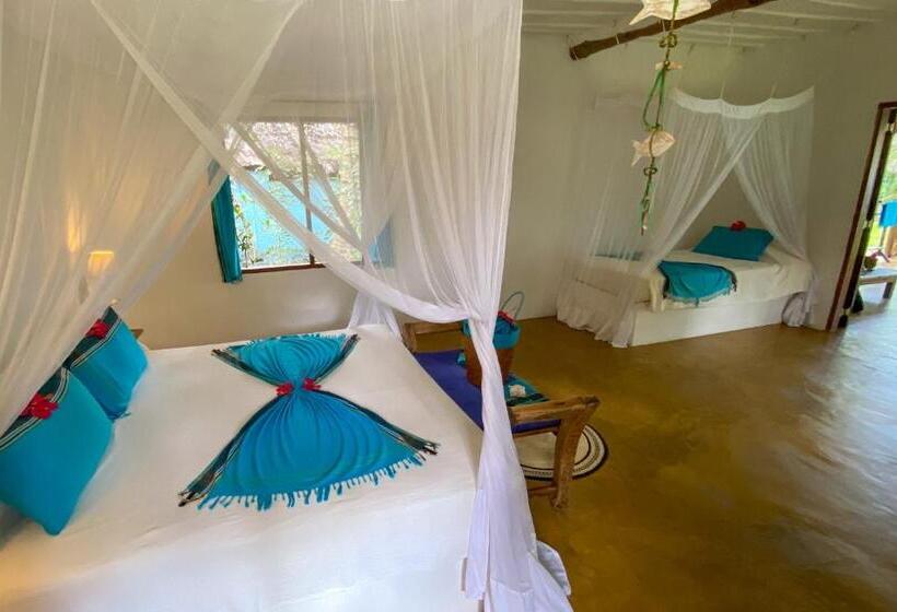 بنجلو قياسى مطلّ علي الحديقة, Butiama Beach Lodge