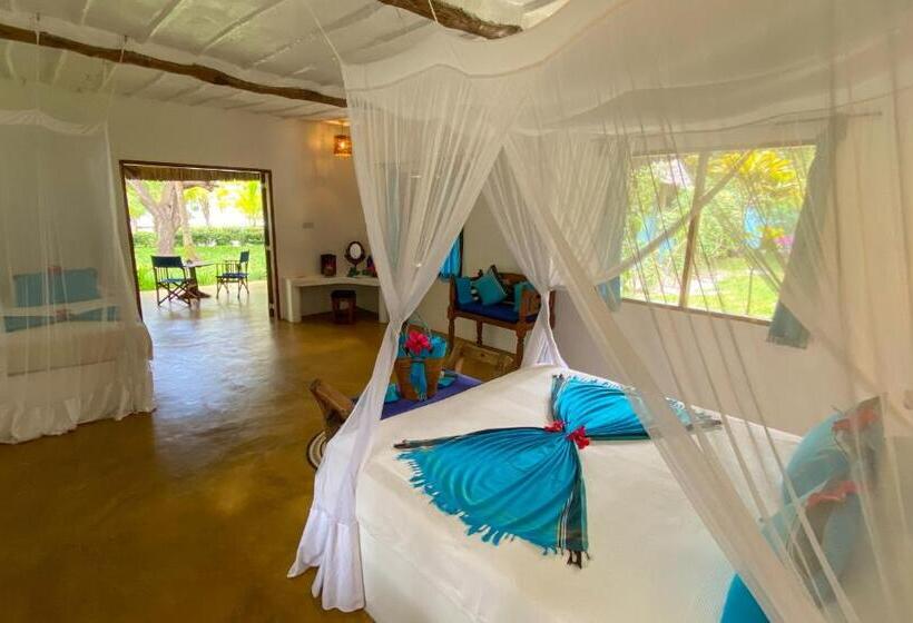 بنجلو قياسى مطلّ علي الحديقة, Butiama Beach Lodge