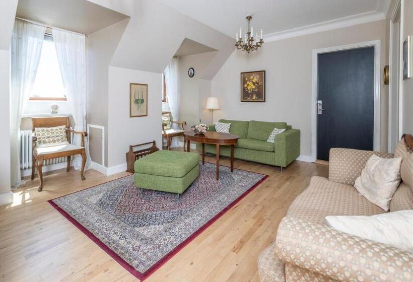 חדר משפחתי דלוקס, Det Gamle Rådhus