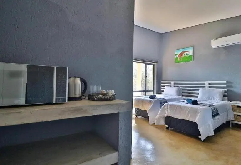 キングサイズベッドのデラックスルーム, Ilanga Kruger Lodge
