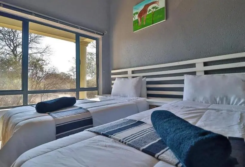 キングサイズベッドのデラックスルーム, Ilanga Kruger Lodge