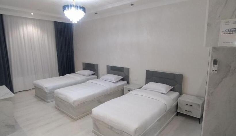 חדר בסיסי לשלושה, Afruza