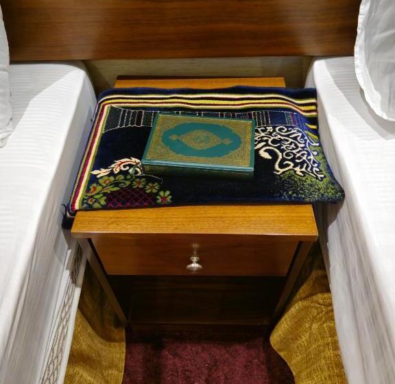 スタンダード4人部屋, فندق ضيوف المقام 3 للغرف والشقق المفروشة توصيل مجاني للحرم