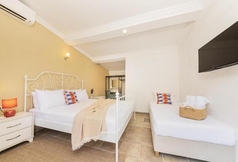 اتاق استاندارد سه تخته با چشم‌انداز باغ, Ki̇raz Beach Otel