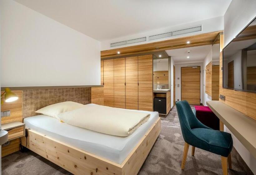 Camera Deluxe Singola, Frechdachs