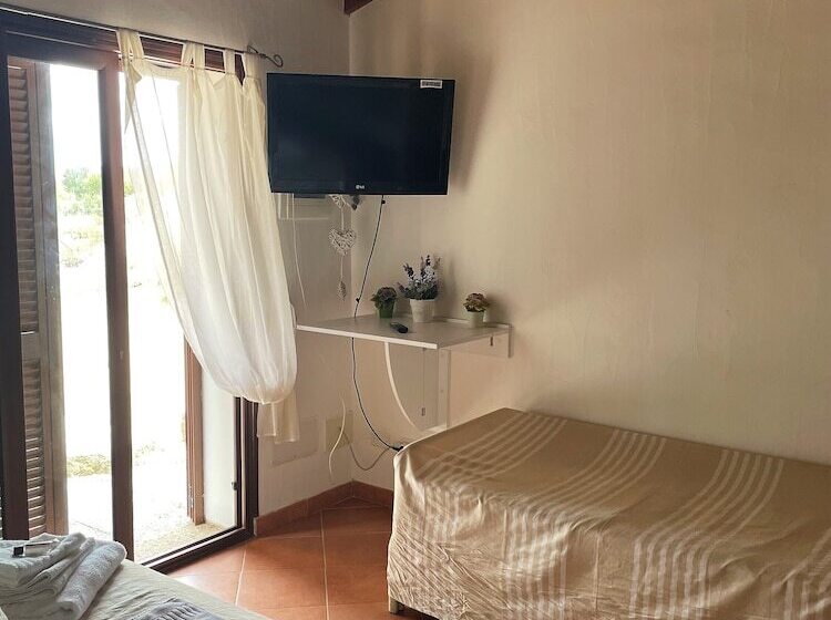 Семейное Студио, B&b Su Donnigheddu