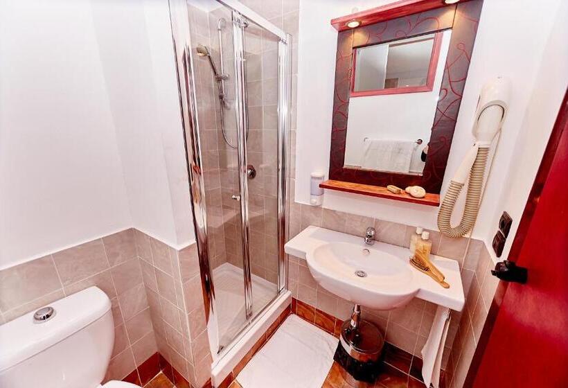 חדר דלוקס, Ospite Inatteso