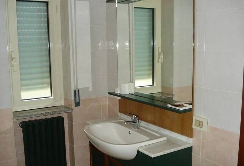 Номер Стандарт Вид на Горы, Grandinetti