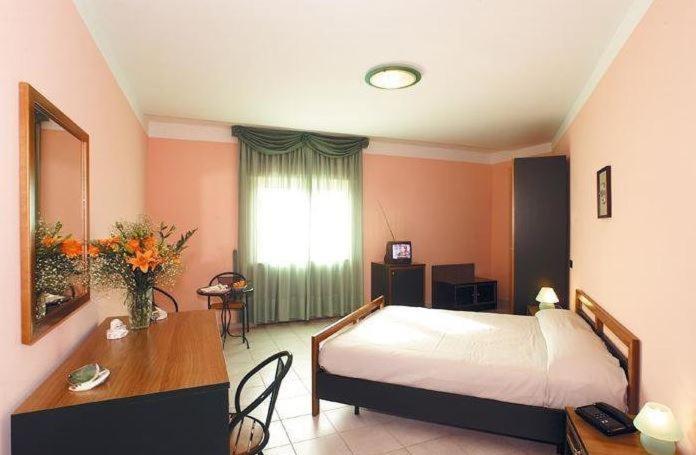 Номер Стандарт Вид на Горы, Grandinetti