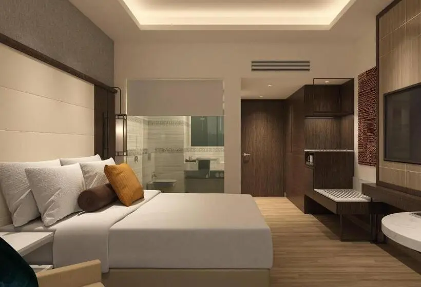 キングサイズベッドのデラックスルーム, Courtyard By Marriott Surat
