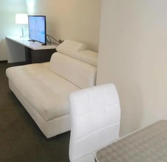 اتاق پریمیوم چهارنفره, Hostal Costa De Marfil Suites & Apartamentos