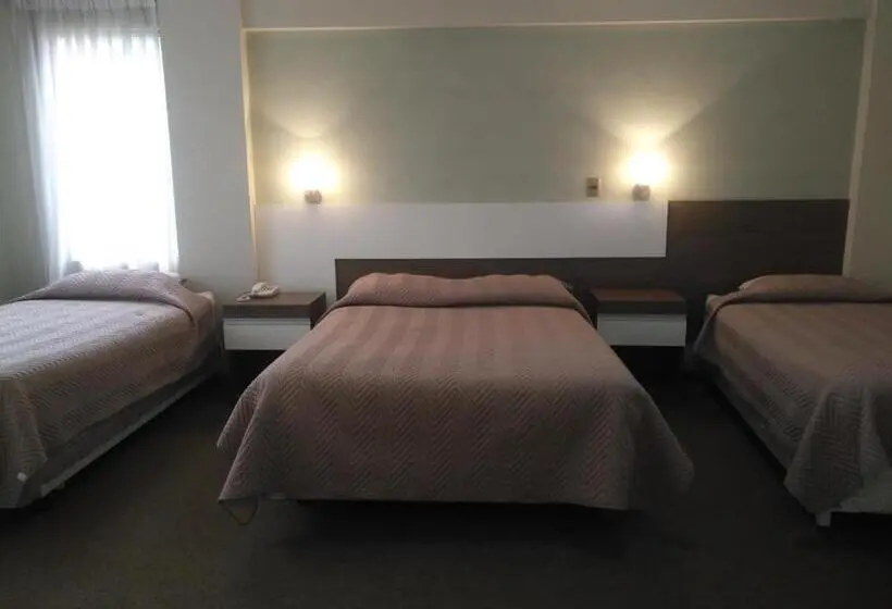 اتاق پریمیوم چهارنفره, Hostal Costa De Marfil Suites & Apartamentos