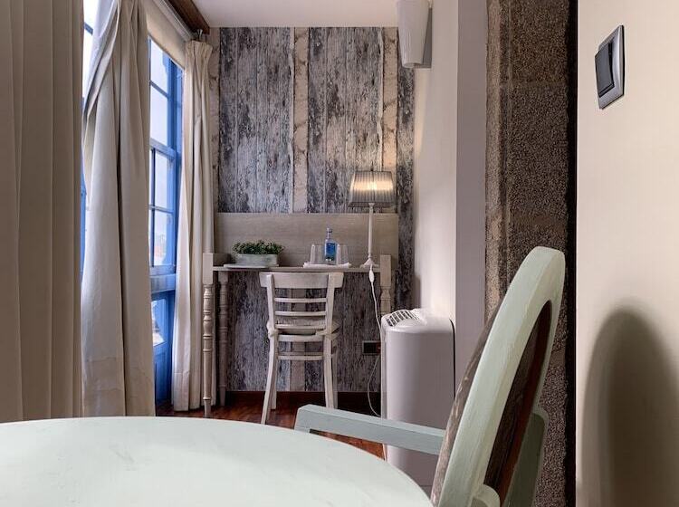 Quarto standard, Casa Do Arxentino