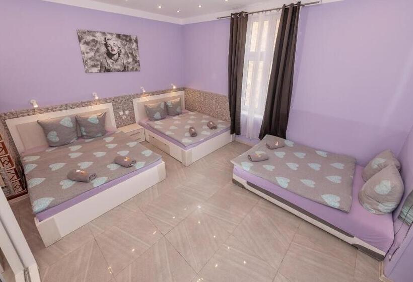 חדר סטנדרט לארבעה, Hostel 70s And Queen Apartments