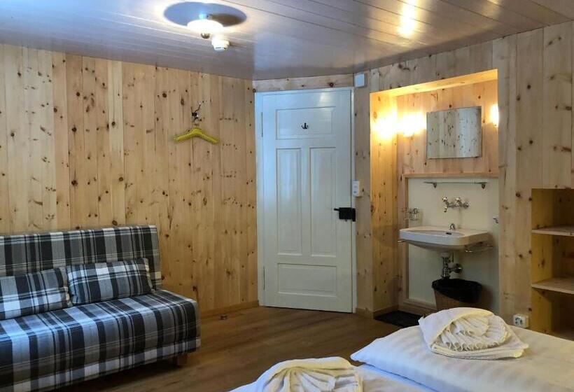 חדר סטנדרט לשלושה עם חדר אמבטיה משוף, Gasthaus Spinas