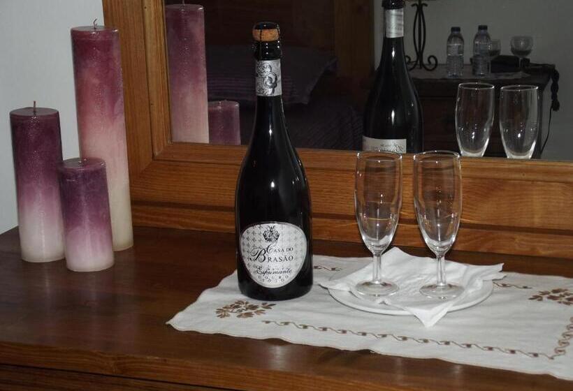 חדר משפחתי, Casa Do Brasao