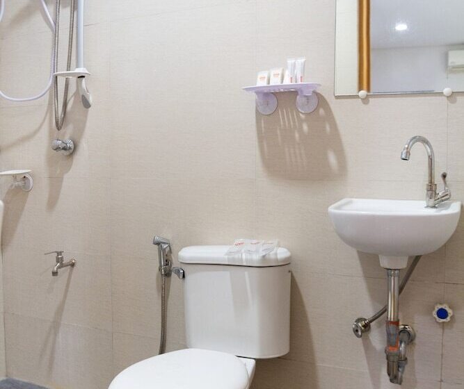 Cama em Quarto Compartilhado, Oyo 153 Monclaire Suites