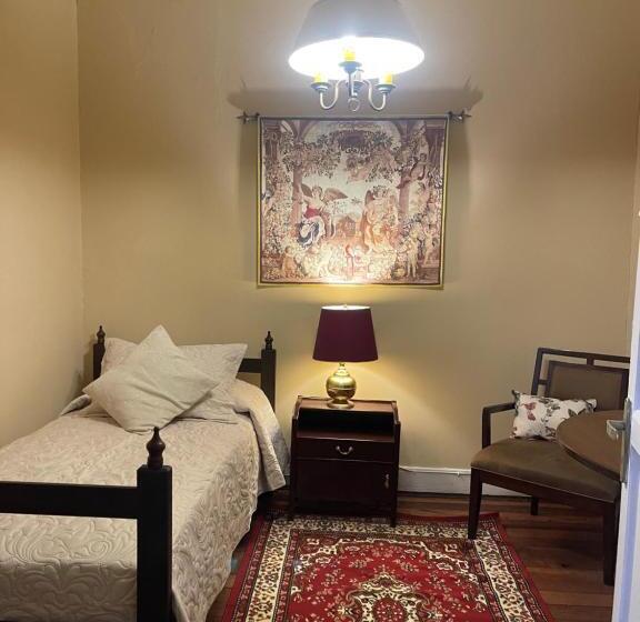 اتاق استاندارد یک تخته با سرویس بهداشتی مشترک, Casa Dos Leones