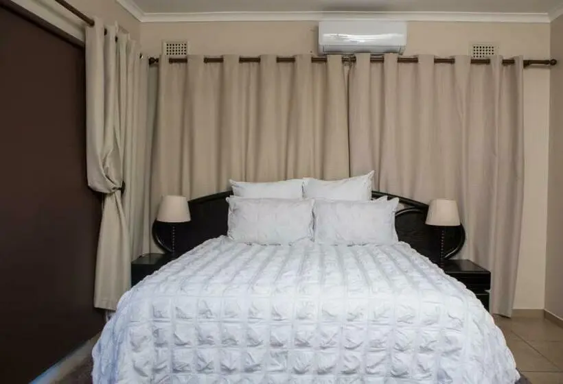 Deluxe-sviitti, Dyna Guest House
