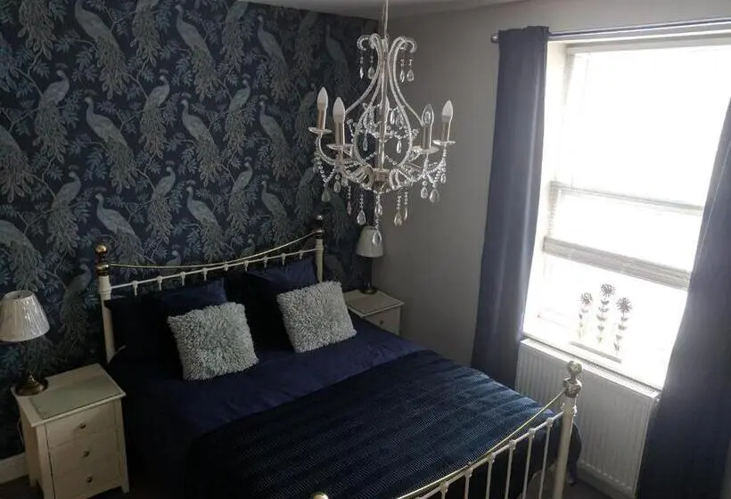 キングサイズベッドのデラックスルーム, Lion House Bed & Breakfast With Restaurant