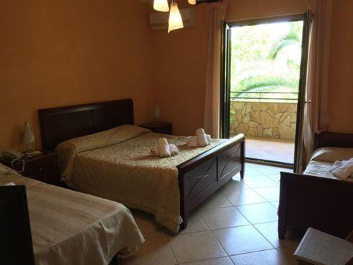 חדר לארבעה סטנדרטי עם נוף לגינה, Agriturismo Terre Delle Monache