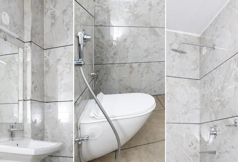 Quarto Deluxe, Treebo Durga Boji Grand, Gonikoppal Town