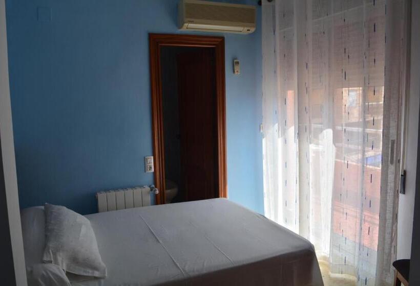 غرفة قياسية فردية, L Escala