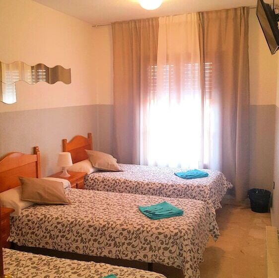 バスルーム共有のトリプルスタンダード, Hostal El Peine