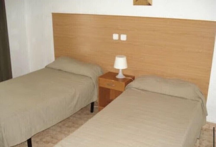 标准单人间, Pensión Santa Fe