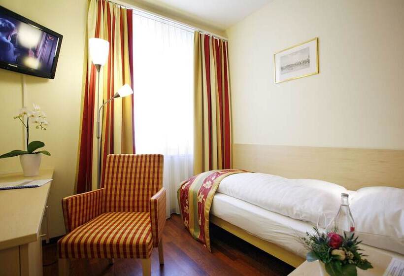 标准单人间, De La Paix