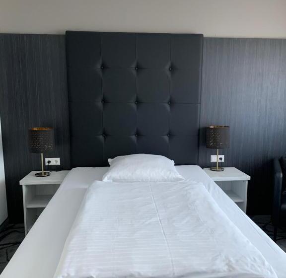 컴포트 싱글 룸, Eisberg Hotel Schwanen