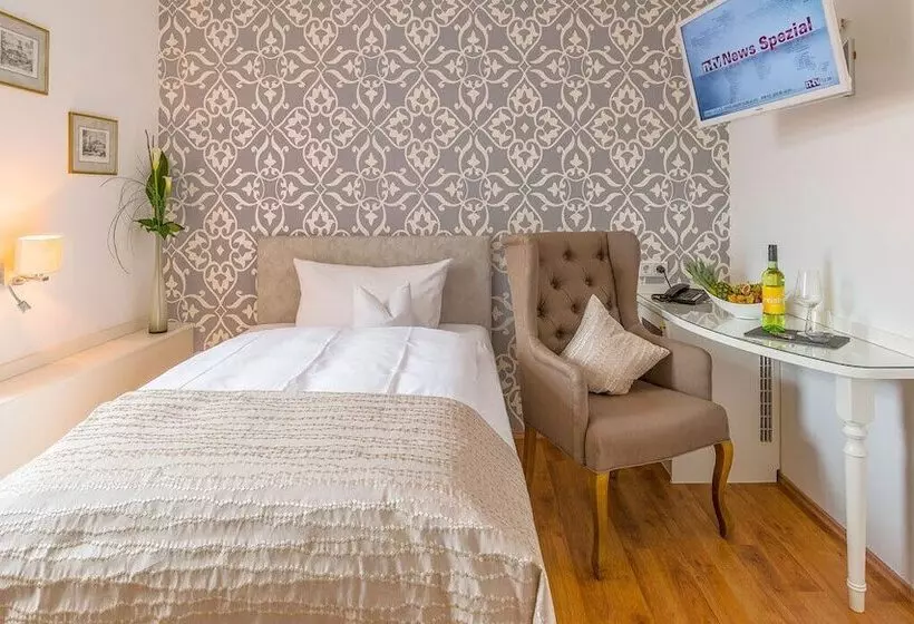 Quarto Estandar Individual, Krone