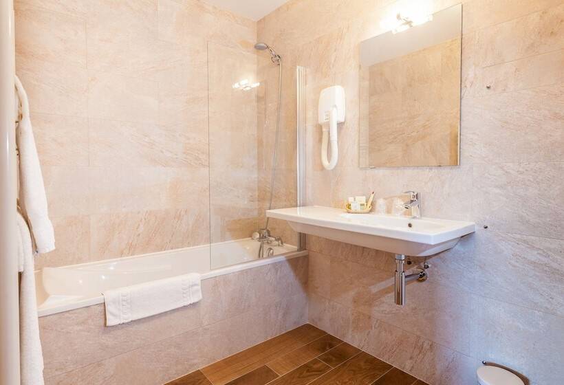 غرفة كومفورت, De La Cloche