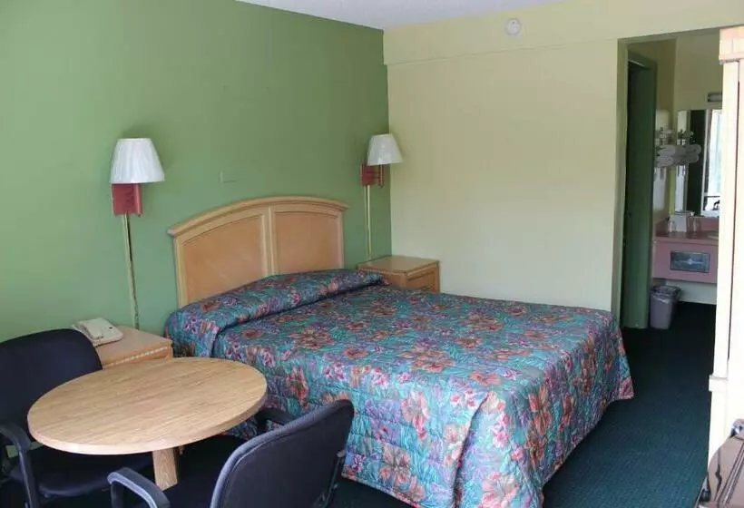 キングサイズベッドのスタンダードルーム, Travelers Inn Gainesville