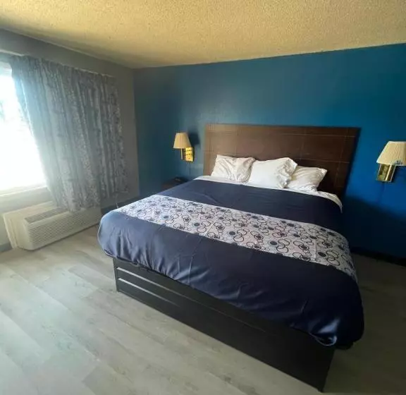 キングサイズベッドのデラックスルーム, Executive Inn And Suites   Jackson