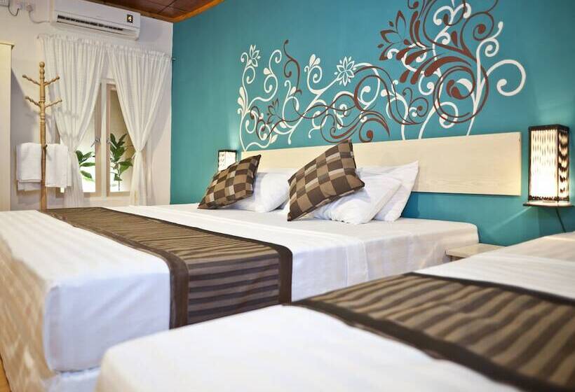 اتاق سه نفره دلوکس با چشمانداز باغ, Stingray Beach Inn