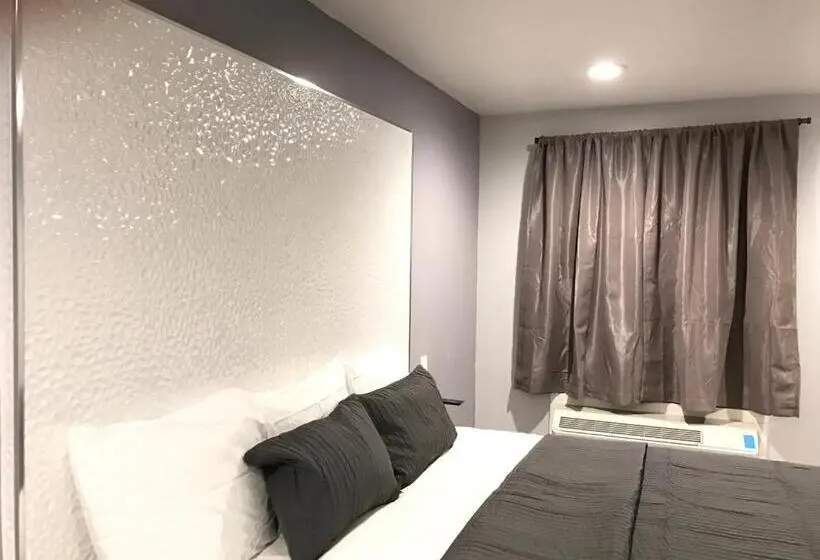 キングサイズベッドのスタンダードルーム, Ramsey Inn & Suites