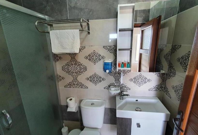 غرفة قياسية رباعية مطلة على البحر, Assos Nazan Motel Restoran Beach